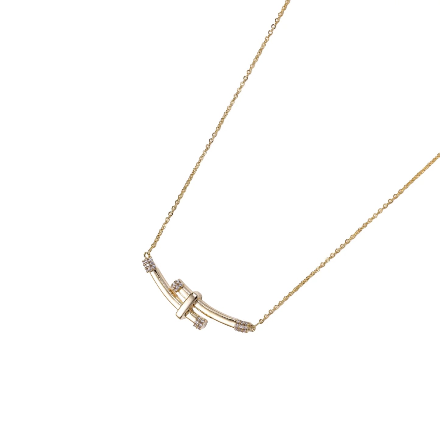 Gold-plated curved bar necklace with diamond accents on delicate chain against cream background