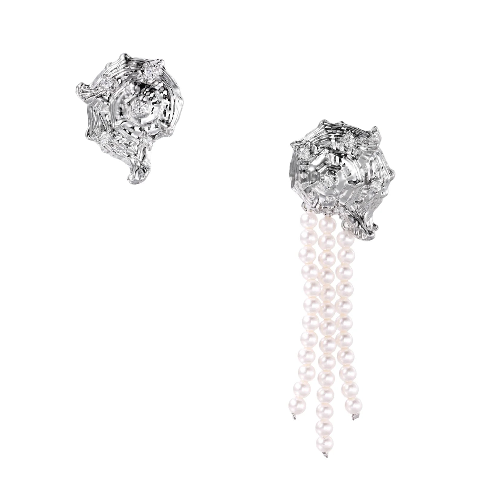 Silver-toned sculptural panther head earrings with zirconia details and white pearl drops on cream background