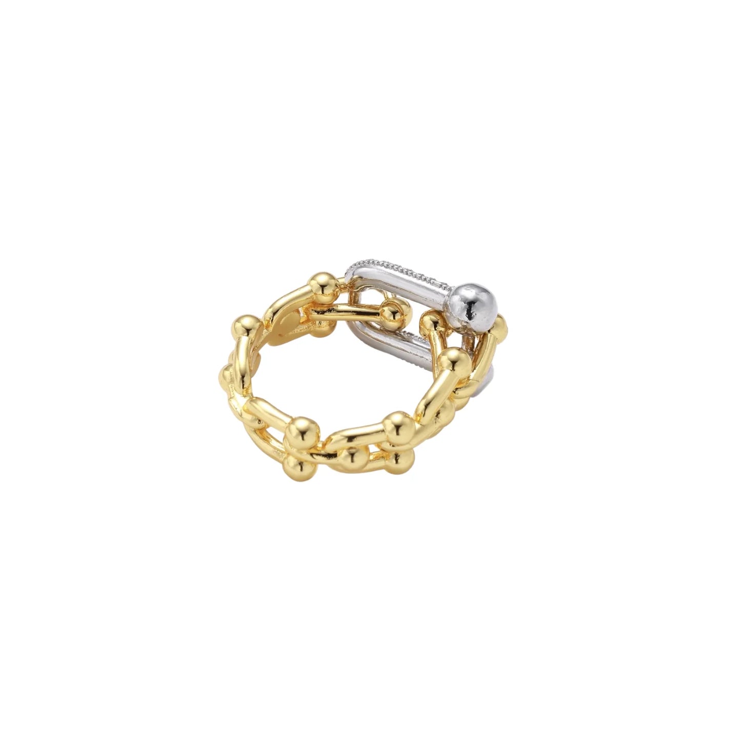 Triple-band gold ring with spherical bead chains and two crystal-pavé bars on cream background