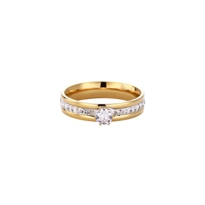 Gold-plated double-band ring with center rhinestone solitaire and channel-set stones on white background