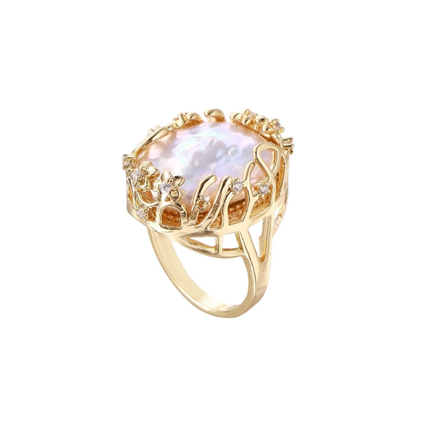 Gold filigree crown ring cradling an iridescent baroque freshwater pearl with crystal accents on white background