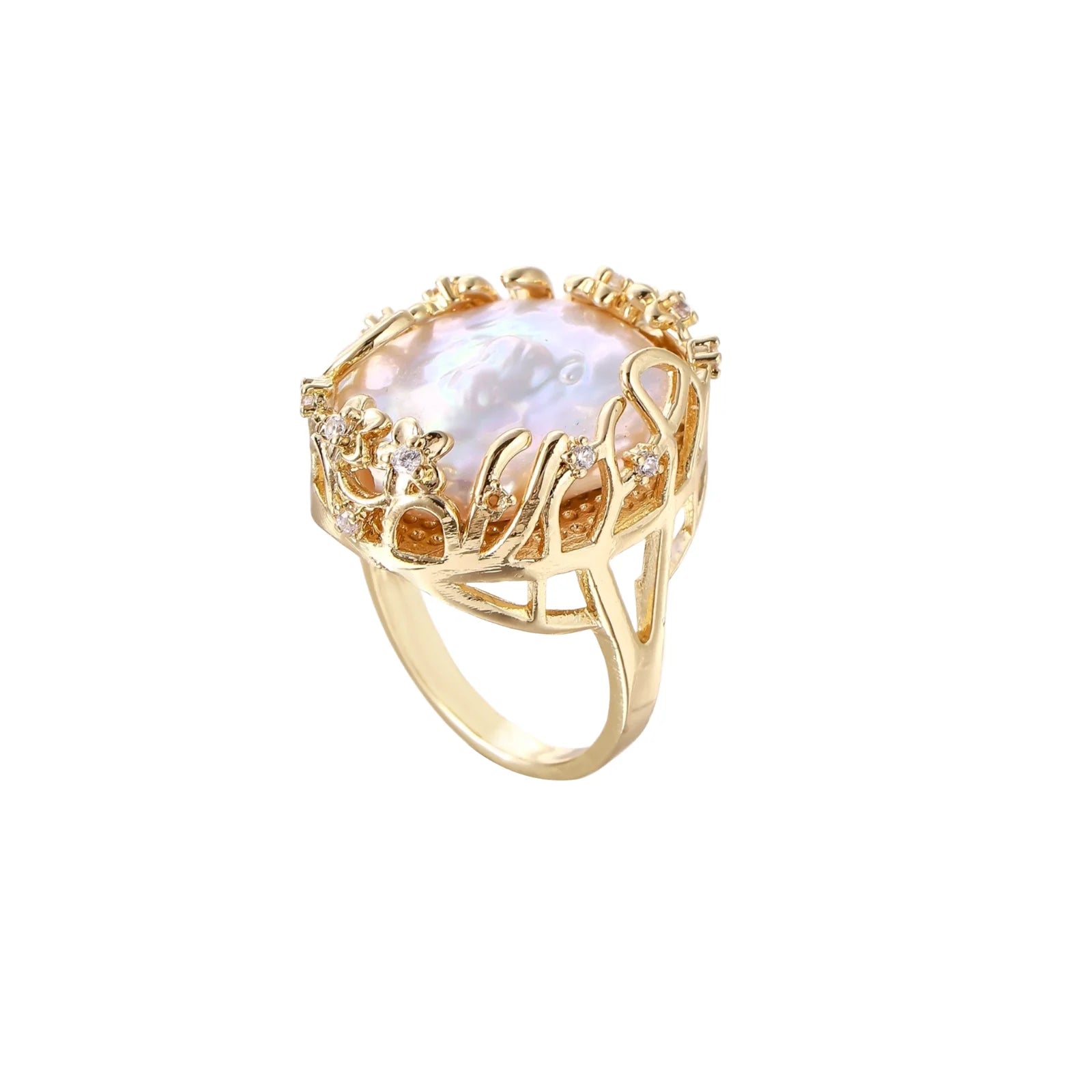 Gold filigree crown ring cradling an iridescent baroque freshwater pearl with crystal accents on white background