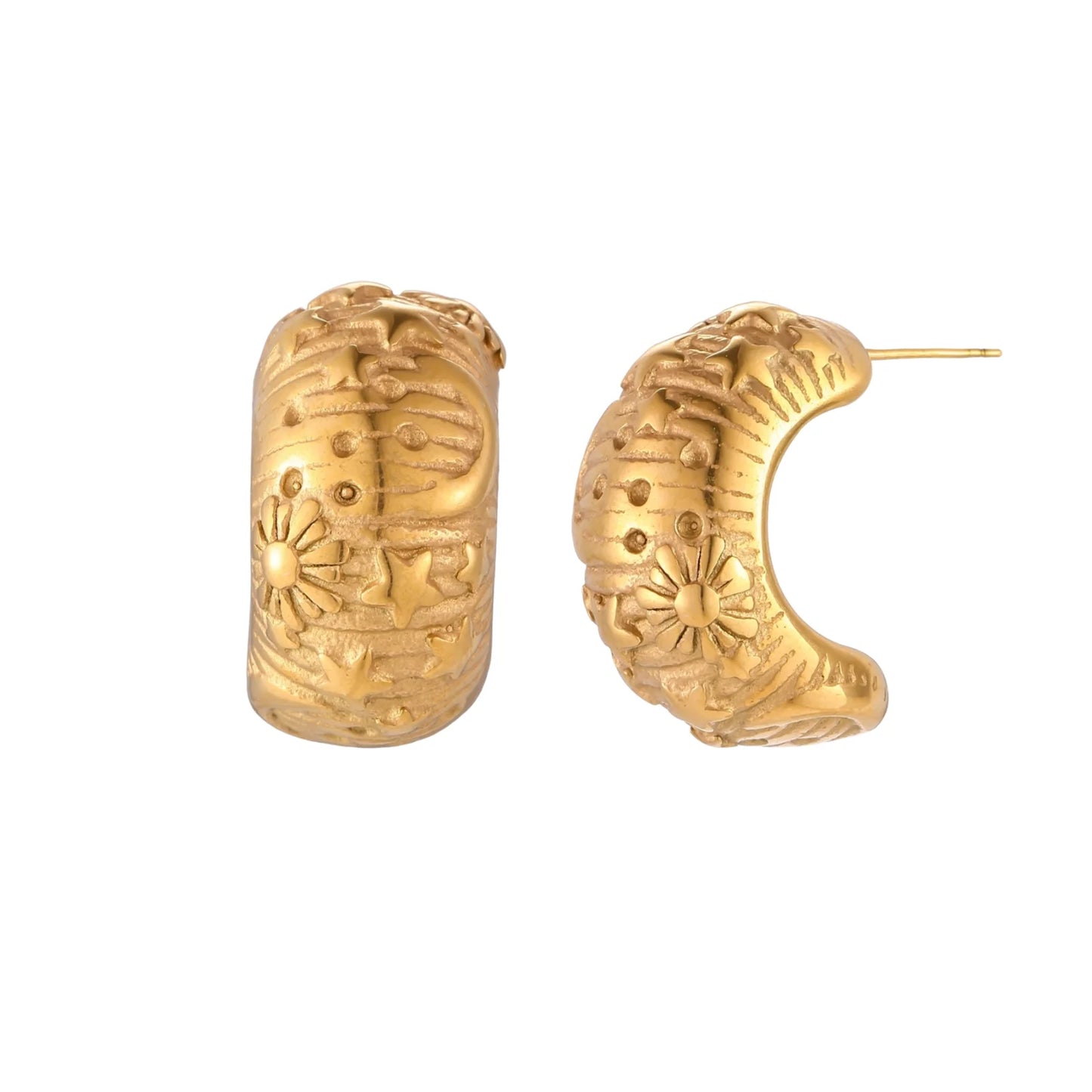 Gold-plated chunky hoop earrings with sun and star engravings on white background, showing detailed celestial pattern work.