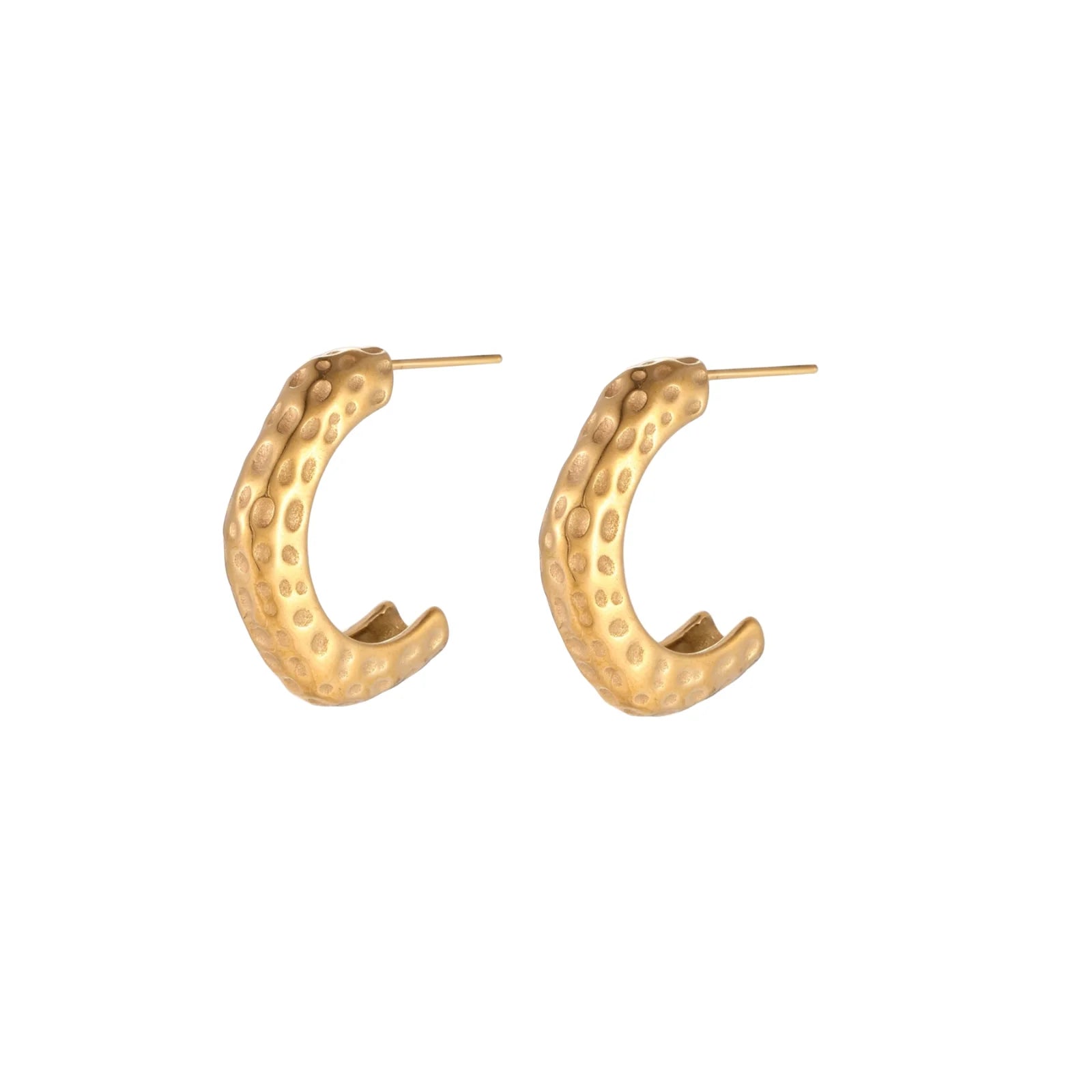 Gold-toned hoop earrings with hammered dimpled texture and post closure on cream background