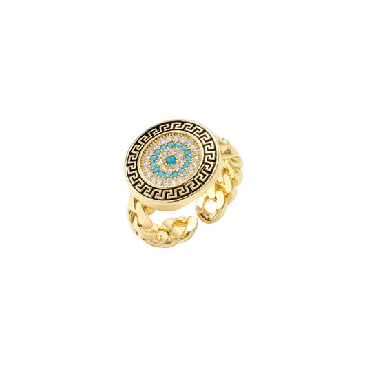 Gold chain ring with Greek key border and turquoise evil eye center on white background