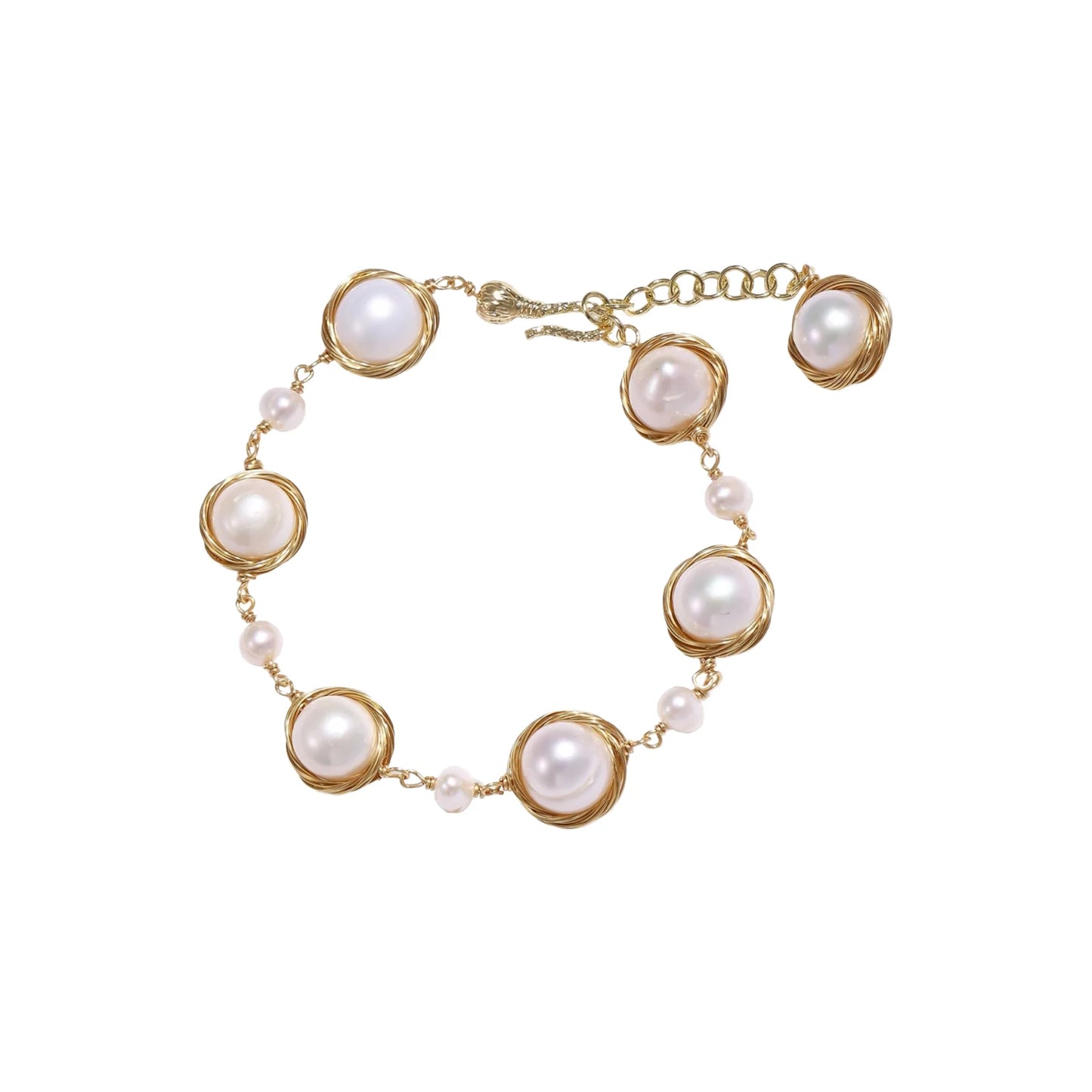 Gold wire-wrapped freshwater pearl bracelet with alternating pearl sizes on cream background, adjustable length