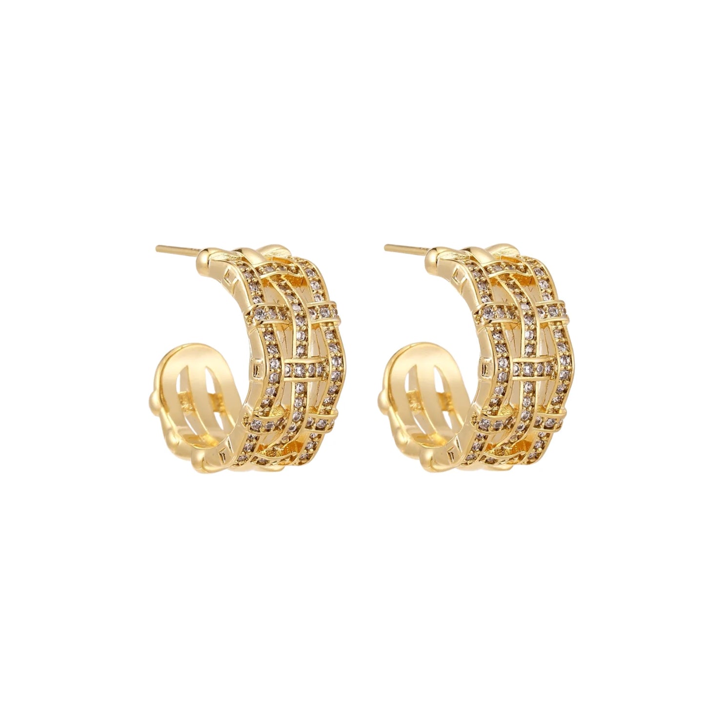 Gold-plated geometric hoop earrings with basket-weave lattice design and pavé crystal accents on cream background
